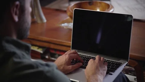 Man working on laptop at home 스톡 동영상 83185100