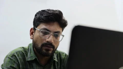 Man working on laptop in modern office lounge 02 Stock Footage 338425167