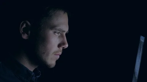 Man working on laptop at night. Stock Footage 96449819