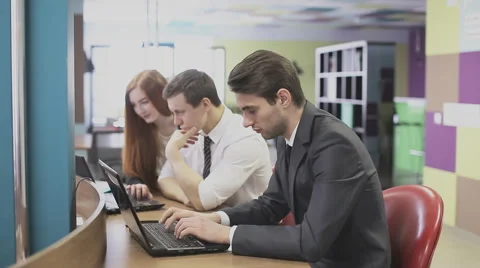 Man working on laptop in office Stock Footage 59851711