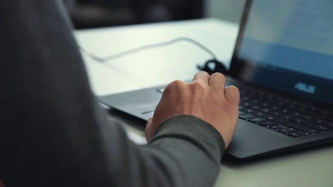 Man working on laptop in office Stock Footage 76000416