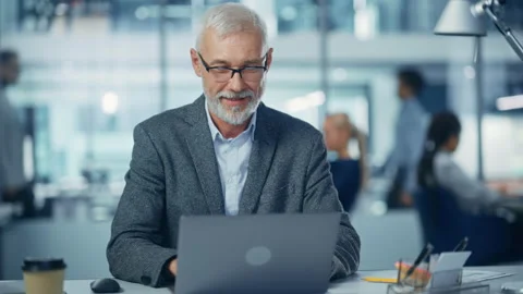 Man Working on Laptop in Office Stock Footage 164294653