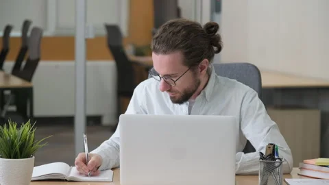 Man working with the laptop at office. Stock Footage 278889909
