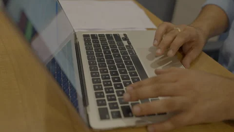 A man working on a laptop in the office Video stock 284003847