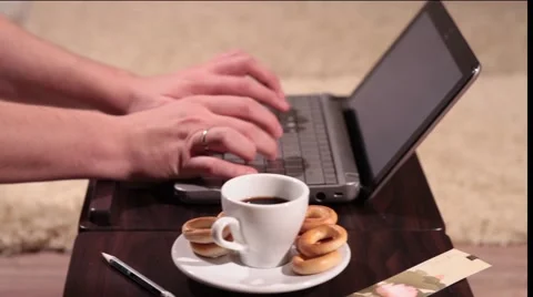 A man is working on laptop -panning shot Stock Footage 58395424