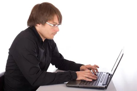 Man working on a laptop Stock Photos