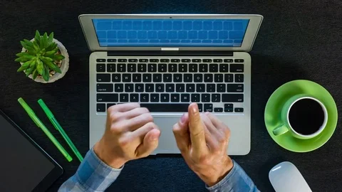 Man working with laptop, top view 스톡 동영상 77701410