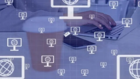 Man working on laptop while pulling from cup, causing floating tech and mail Stock Footage 335732019