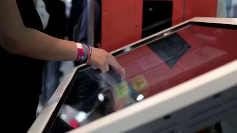 Man Working on a Large Touch-Screen Monitor 库存影片 70935521