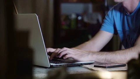 Man working late on laptop Stock Footage 85173876
