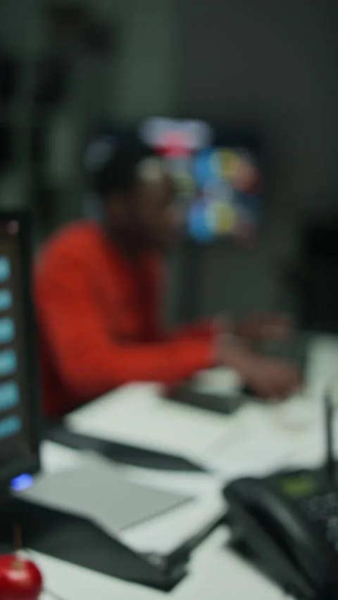 Man Working Late Typing on Computer in Modern Office Stock Footage 346706327
