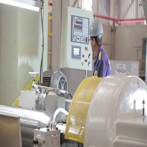 Man working on lathe Stock Footage 69709201