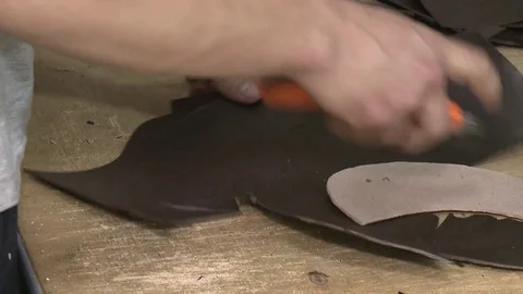 Man working with leather Stock Footage 76613746