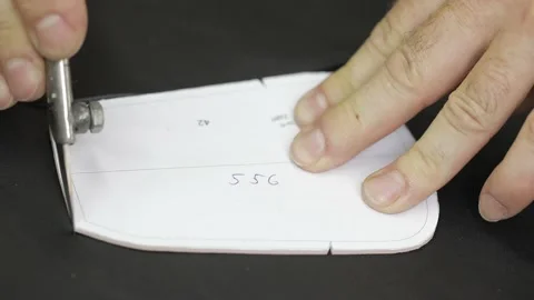 Man working with leather, shoemaker designer fashion work with shoes boots close Stock Footage 143710391