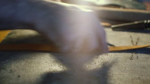Man working with leather using crafting DIY tools Stock Footage 71389953