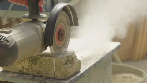 Man working with a manual cutting tool Stock Footage 171862011