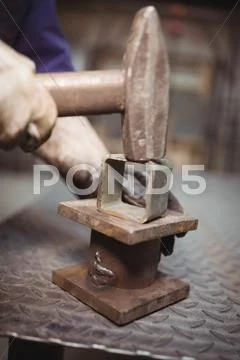 Man Working On A Metal Work
