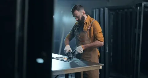 Man working with metal at the workshop Stock Footage 147292858
