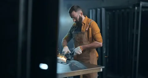 Man working with metal at the workshop Stock Footage 147292896