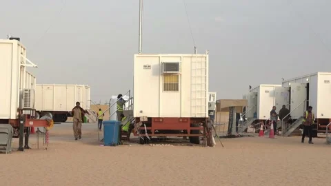 Man working in mobile office in desert Stock Footage 144687525