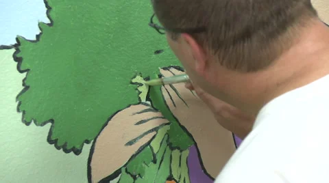 Man working on mural Stock Footage 57714024