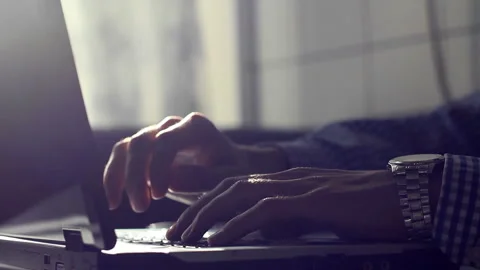 Man working on my laptop in the background sunlight Stock Footage 120291863