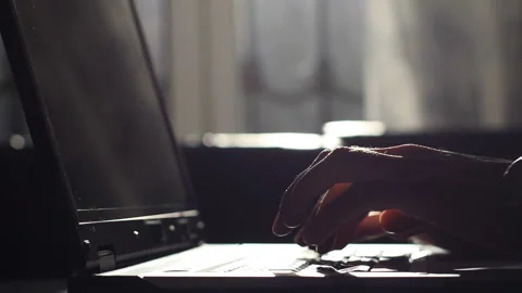 Man working on my laptop in the background sunlight Stock Footage 120291896