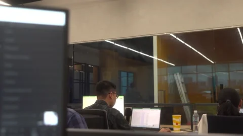 A man working in an office Video stock 236393172