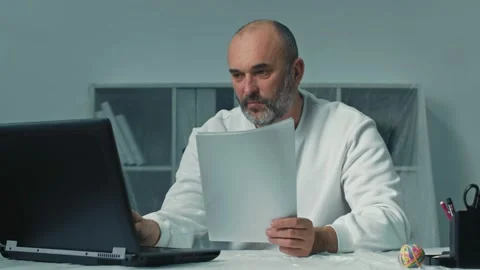 Man working in office in pandemic time. Work in the time of covid-19 Video stock 168946637