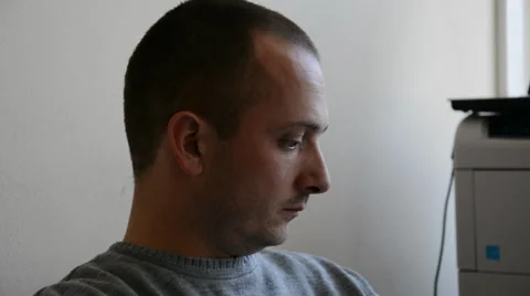 Man working in the office, reading papers Video stock 39764284