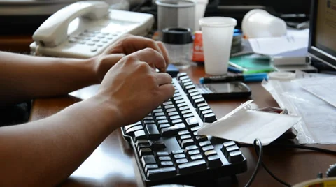 Man working in the office, typing Stock Footage 39764262