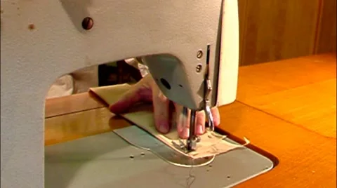 Man working on old-style manual sewing machine. With sound Stock-Footage 44332043