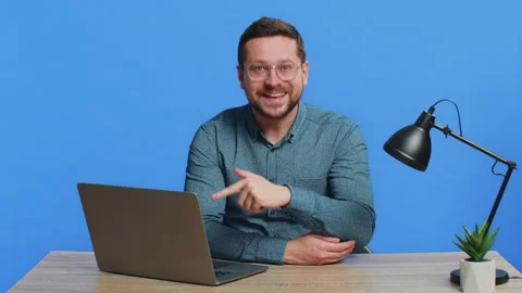 Man working online on laptop, recommend program application game, positive Stock Footage 313768550