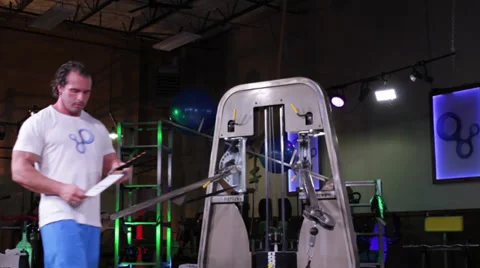 Man Working Out With Cable Machine Stock Footage 32422538