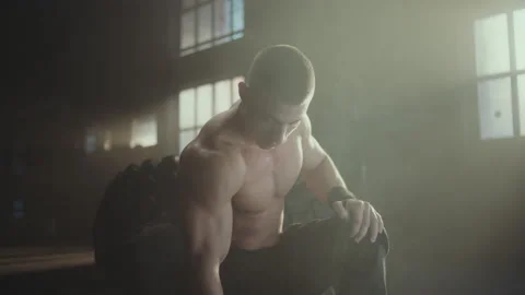 Man working out with dumbbell Stock Footage 236181701