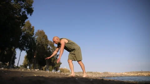 Man working out at the gym doing a stunt workout Stock Footage 238734027