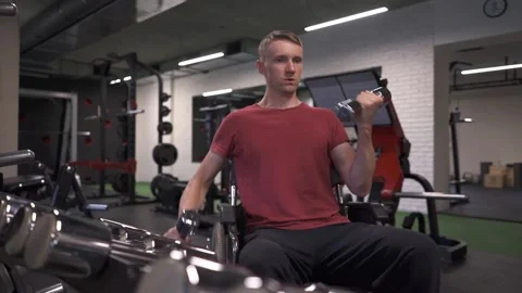 Man working out at the gym Stock Footage 205618475