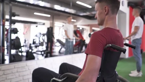 Man working out at the gym Stock Footage 205618558