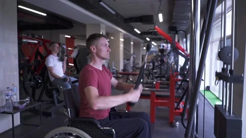 Man working out at the gym Stock Footage 205618600
