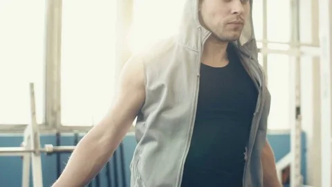 Man working out jumping rope in a gym Stock Footage 72029747