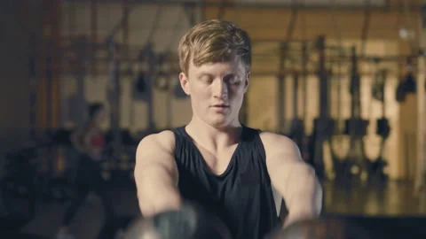 Man working out with kettlebells Stock Footage 152907240