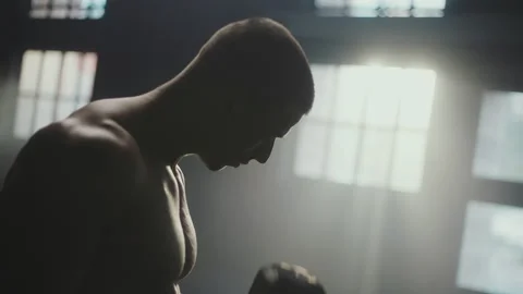 Man working out muscles using dumbbells Stock Footage 236179676