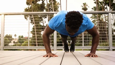 Man working out in the park Stock Footage 114229638