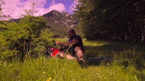 Man working outdoors with laptop Stock Footage 133331160