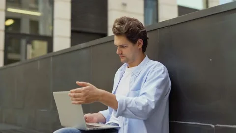 Man working on pc and thinking outside Stock Footage 134573138