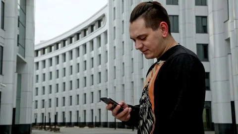 A man working with the phone. Video stock 73087666