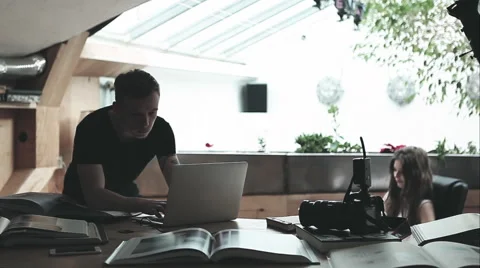 Man working in photo studio Stock Footage 64566715