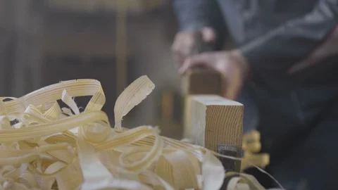 Man is working on a plank of woon in workshop 스톡 동영상 98046830