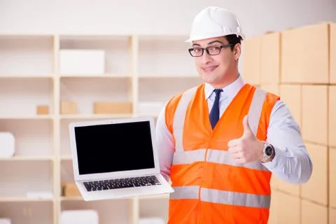 Man working in postal parcel delivery service office 스톡 사진