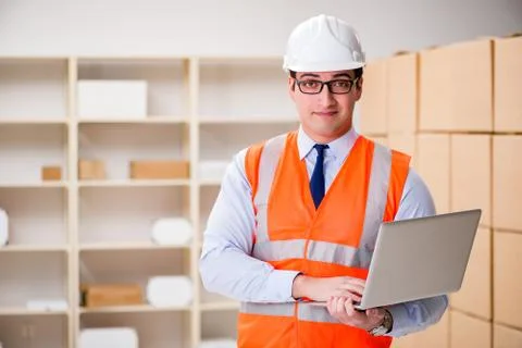 Man working in postal parcel delivery service office 스톡 사진